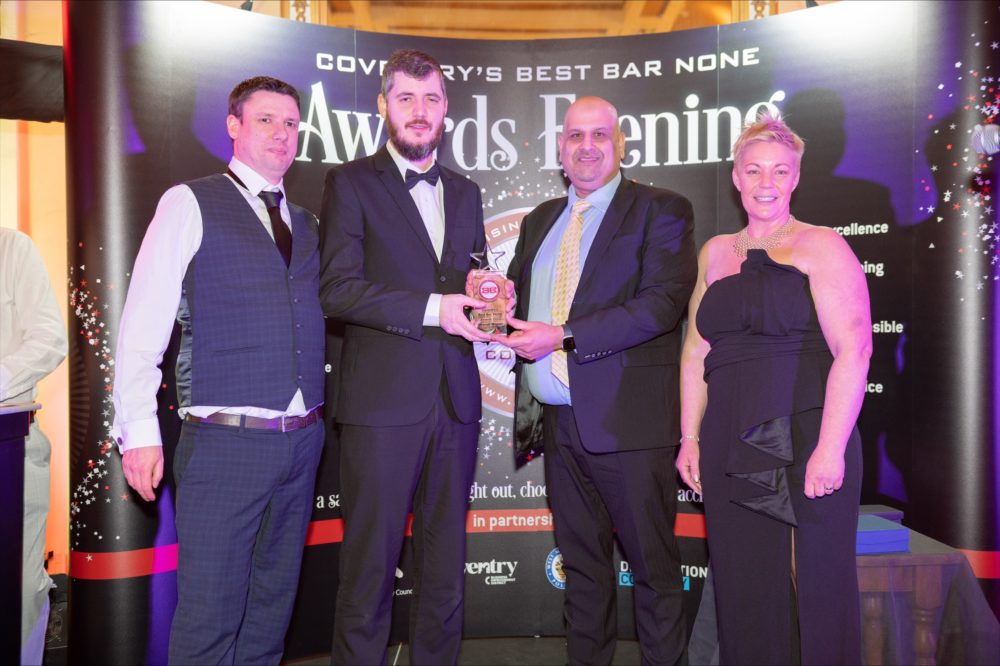 Overall Best Bar None winners in 2022 - Gavin Healy (Flying Standard JD Wetherspoon) and Rob Browning (Area Manager JD Wetherspoon), Cllr Abdul Salam Khan and Joanne Glover (Coventry BID).